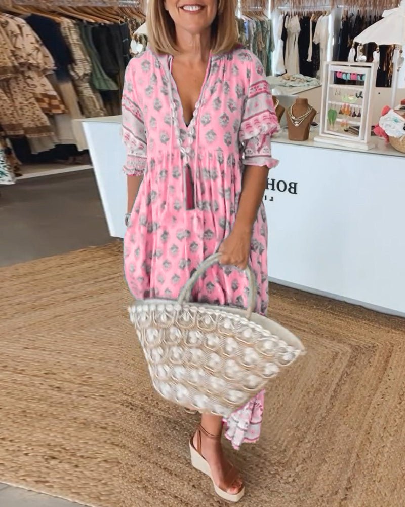Mana | Vestido midi chic con estampado floral y escote en V