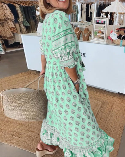 Mana | Vestido midi chic con estampado floral y escote en V