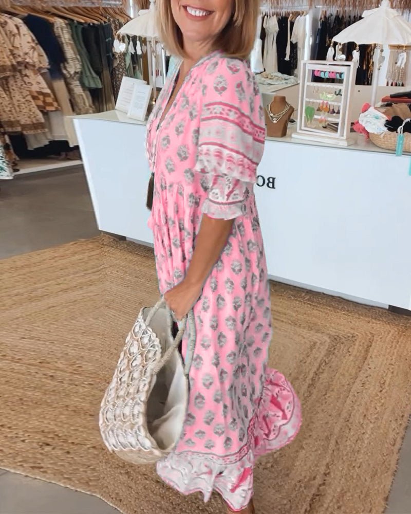 Mana | Vestido midi chic con estampado floral y escote en V