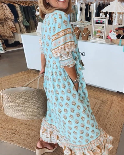 Mana | Vestido midi chic con estampado floral y escote en V